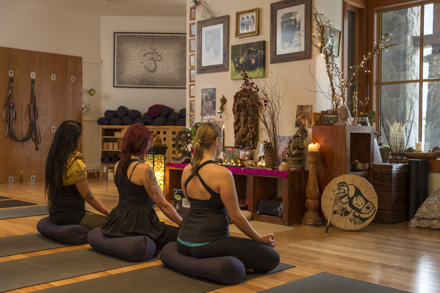 People mediating and doing yoga in a quiet room