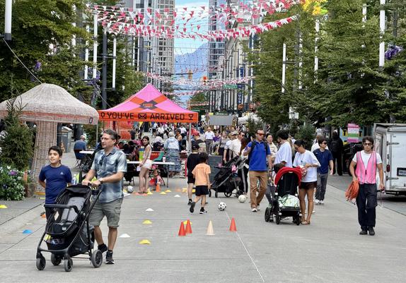 Busy street filled with people, especially families all day. Free flower, free photobooth, live music, feee games and giveaways in stores, LOTS to do, our family was there for 4.5 hours and didn’t want to leave!