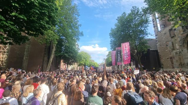 Crowd on a sunny Dom square, by our medieval cathedral.