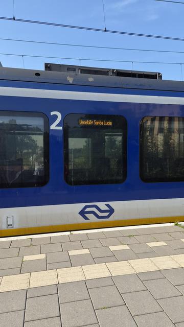 Photo of commuter train with destination sign Venice