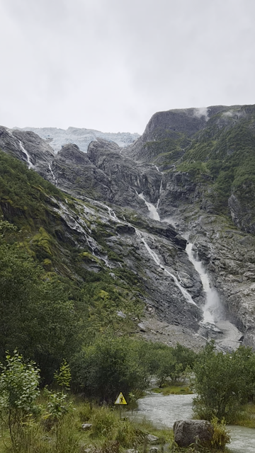 Short video of glacier in Jostedalsbreen with melt water stream.