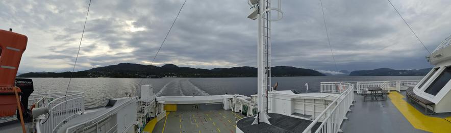 Panoramic view over ferry and fjord