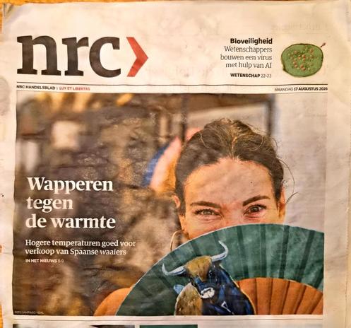 Photo of frontpage with that headline and woman smiling from behind her fan.