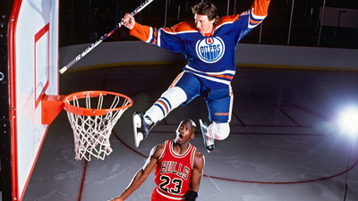 An AI image of an Oilers player resembling Wayne Gretzky leaping above a Bulls player resembling Michael Jordan beside a basketball hoop, holding a hockey stick.