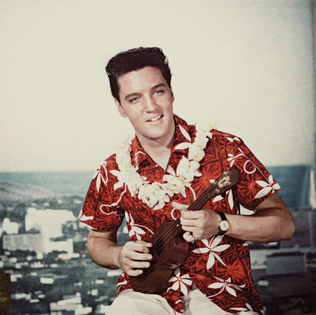 Elvis Presley is fashion florid as a gyrating tour guide in 1961's Blue Hawaii