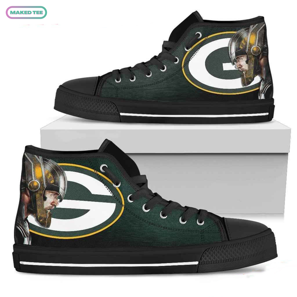 https://sfo3.digitaloceanspaces.com/images.makedtee/2023/02/Thor-Head-Beside-Green-Bay-Packers-High-Top-Shoes-Sport-Sneakers.jpg