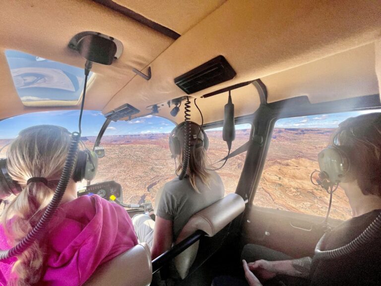3 people in a helicopter in Moab