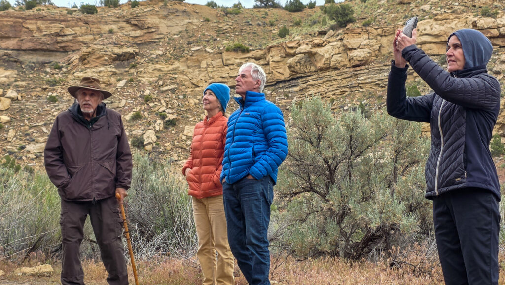 Guests listening as Don Montoya explains the lives of the Ancestral Puebloan people.
