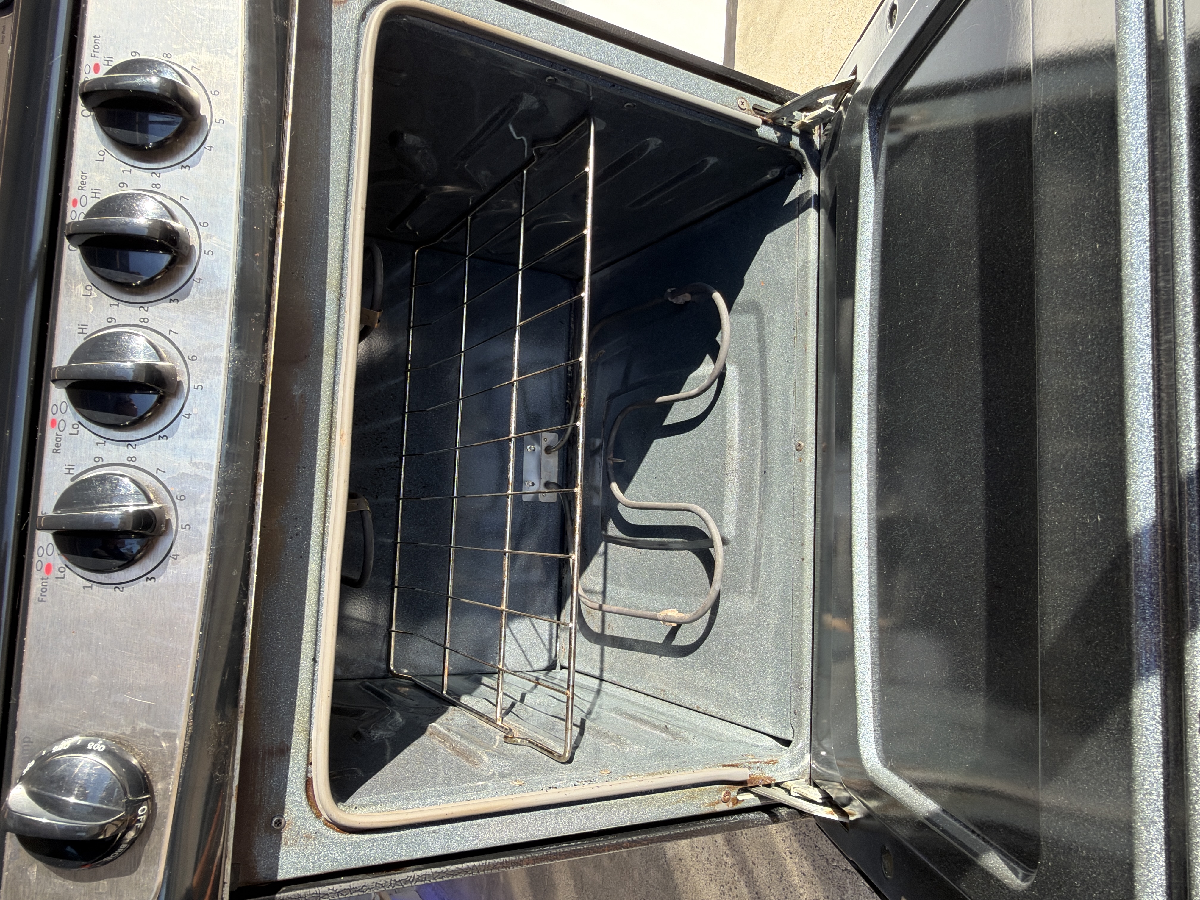 Stainless steel 24”wide coil top range - $579.00 - GE-RG-0000295