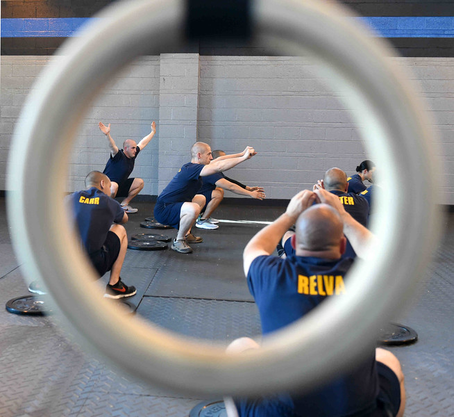 (Peter Hvizdak - New Haven Register) New Haven Police Academy recruits perform physical exercise Wednesday afternoon, April 20, 2016 during a CrossFit pilot program specifically created for police training a the New Haven Police Academy gym on 200 Wintergreen Ave. in New Haven.