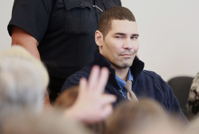 Christopher Monfort acknowledges his family as he arrives to hear his penalty verdict at the King County Courthouse Thursday July 23, 2015. Monfort killed Seattle police officer Timothy Brenton on Halloween, 2009.  (Bettina Hansen / The Seattle Times)