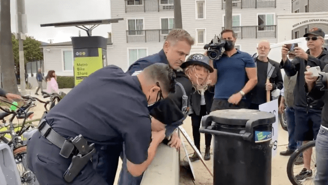 Officers wrestle knife