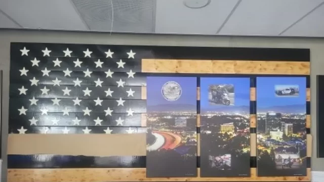 Image of the Thin Blue Line flag being masked at the LAPS Valley Traffic Division lobby. (Photo by Los Angeles Police Protective Union)
