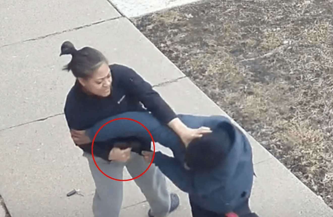 The off-duty officer fights with the suspect to maintain possession of her weapon. (COPA)