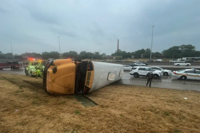school bus overturns