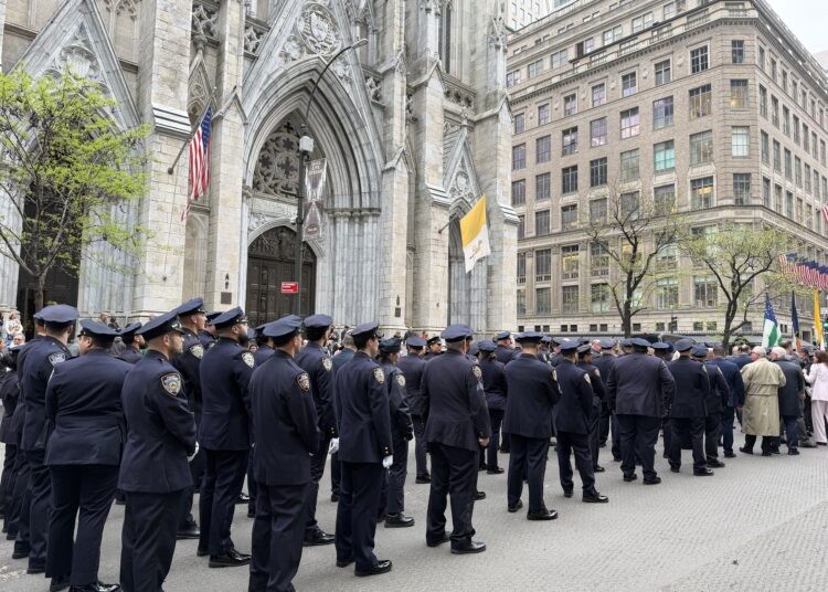 NYPD Holy Name Society members outside St. Patrick’s Cathedral, New York City, April 19, 2026 (NYPD officers in formation following Mass, prior to the procession through the city streets to the New York Hilton Midtown for the Communion Breakfast—reflecting unity, discipline, and shared purpose) — (Vincent J. Bove / Reawakening America, LLC)
