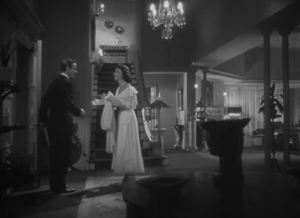 A video clip called Fix yourself a drink, I've got to change this torn dress.