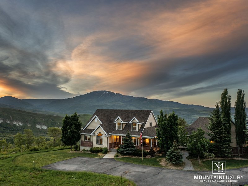 A beautiful off grid in mountain green utah at sunset.