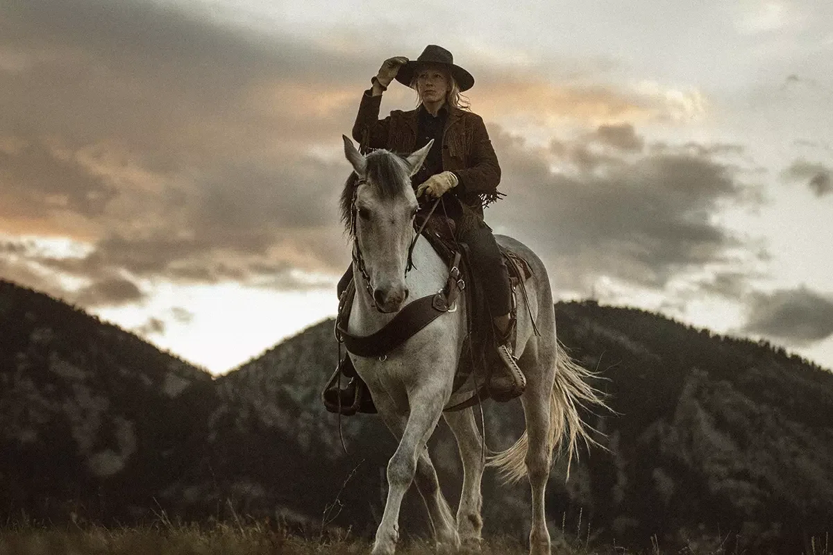 A Woman Riding a Horse at Osprey Ranch