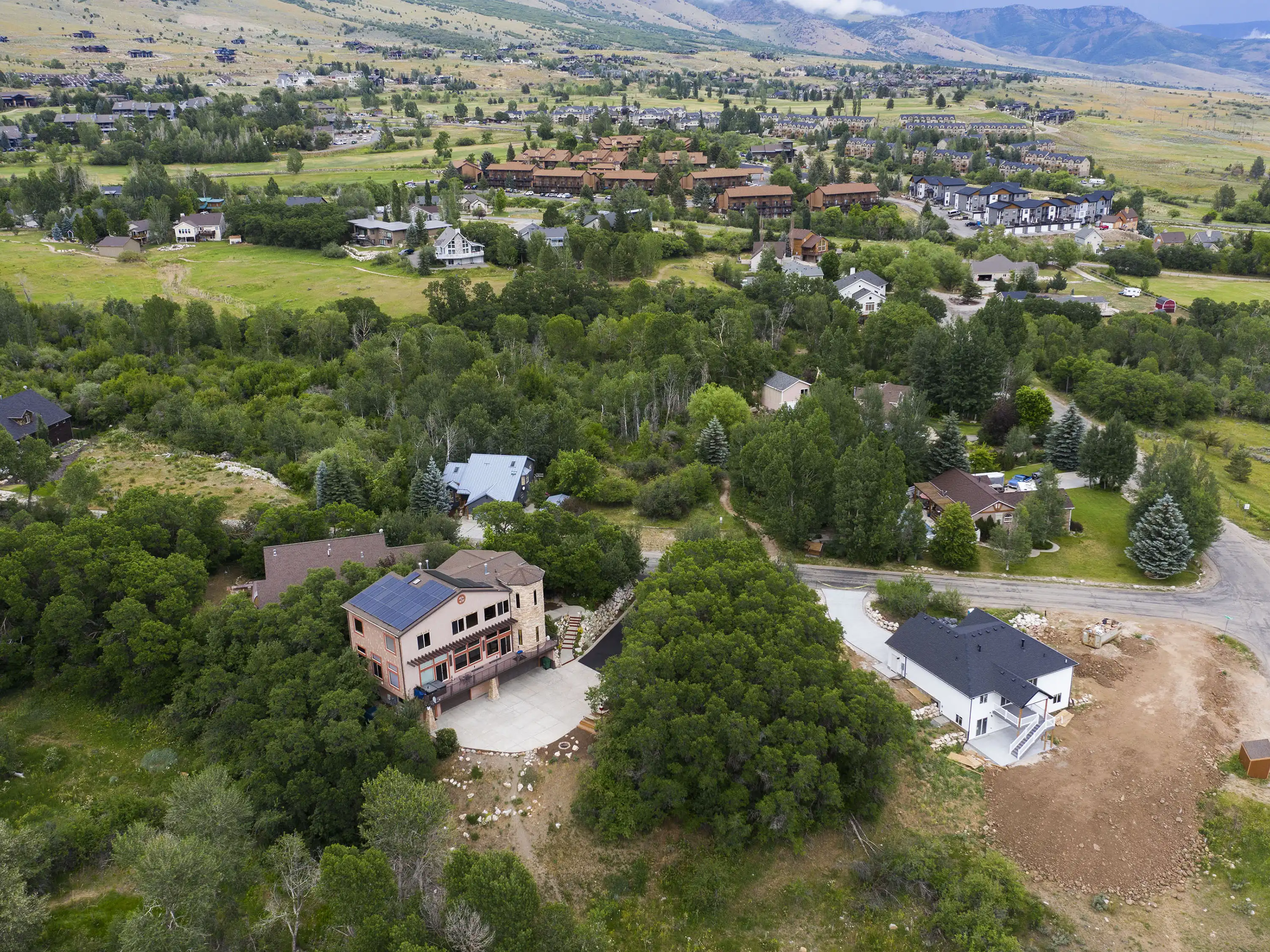 Patio Springs Drone Photo of Homes & Land With Mountain Views