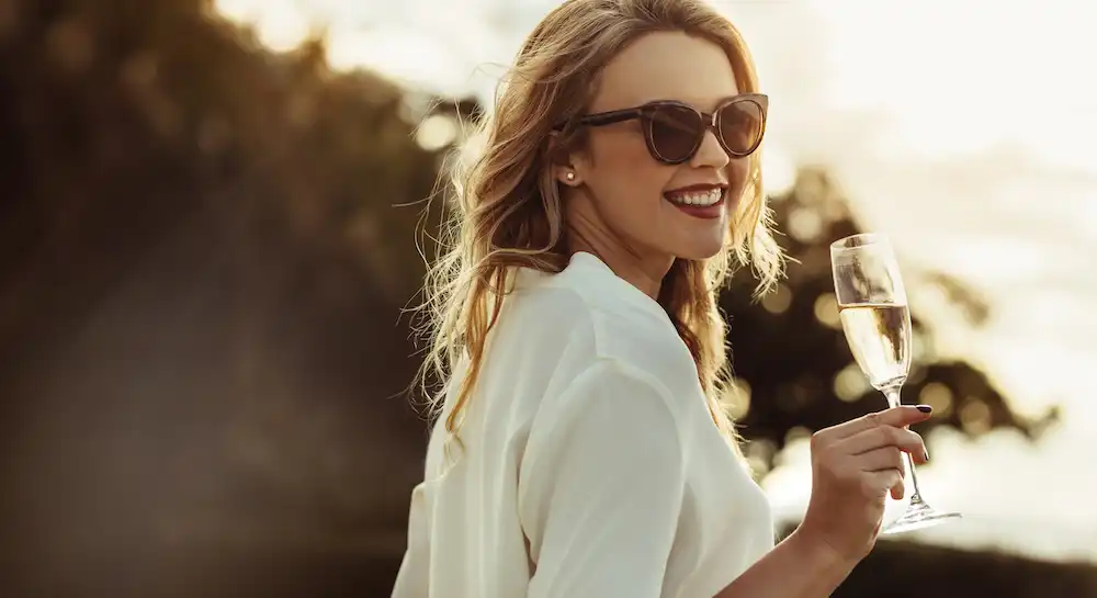 Girl with Sunglasses and Champagne