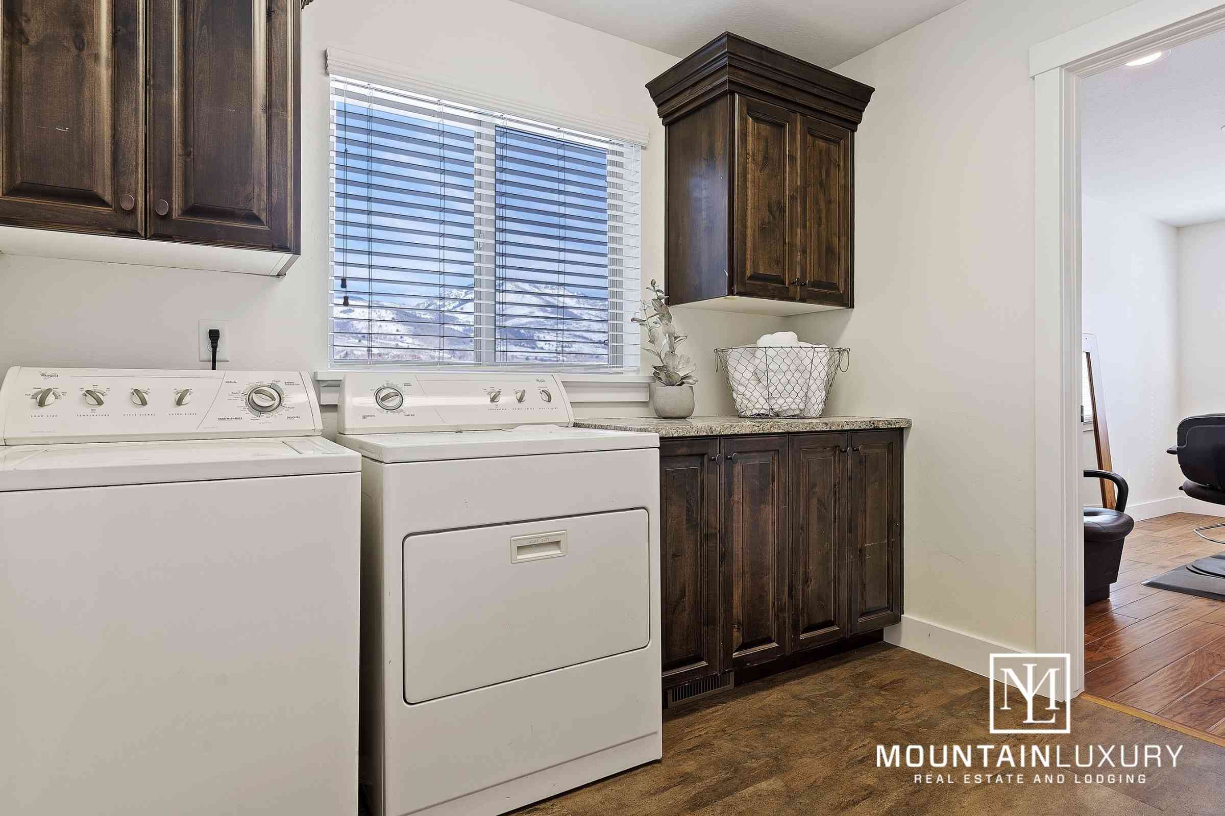 4560 N Abbey Way, Eden, laundry room & salon area shot