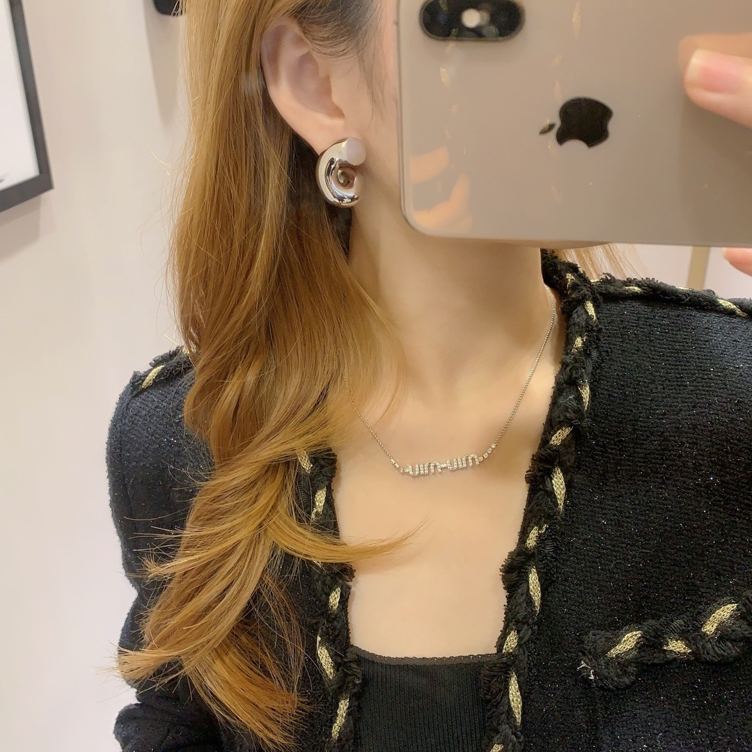 Bottega Veneta Silver Swirl Earrings – Designer Jewelry