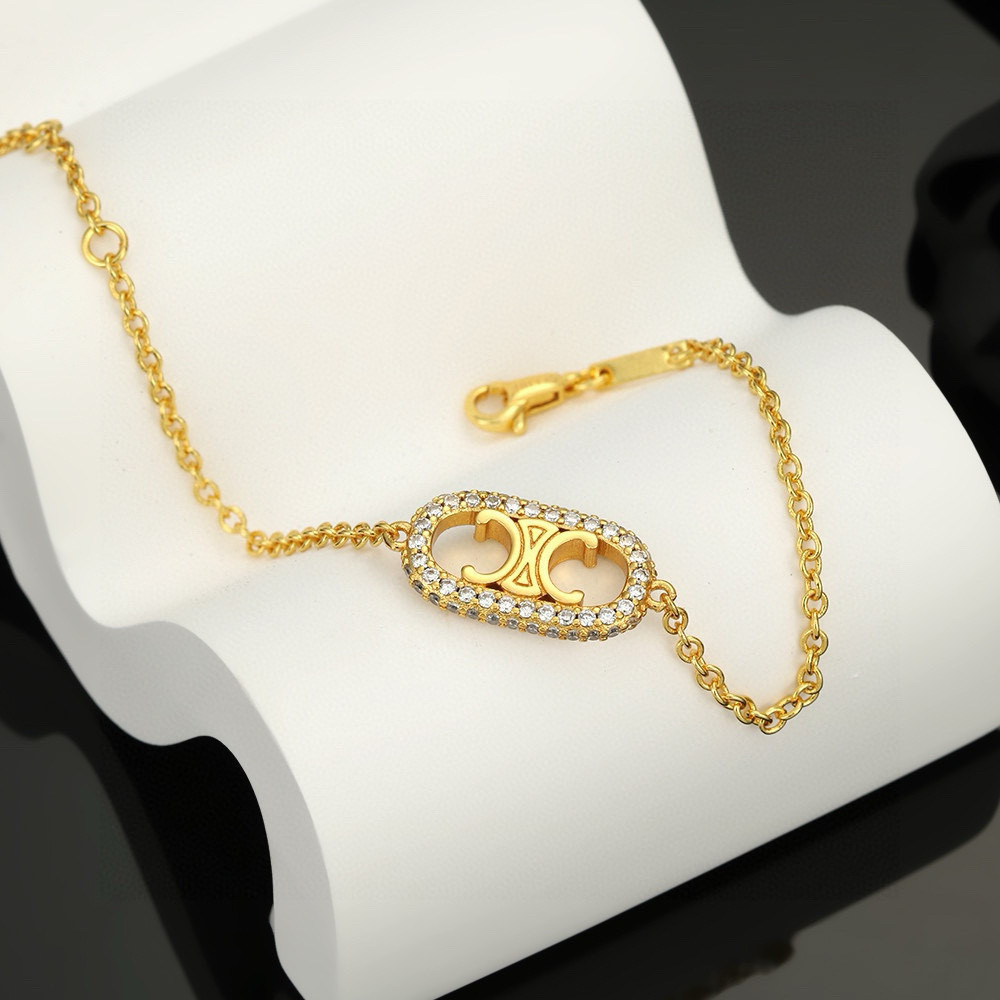Celine Gold Crystal Logo Bracelet – Designer Jewelry