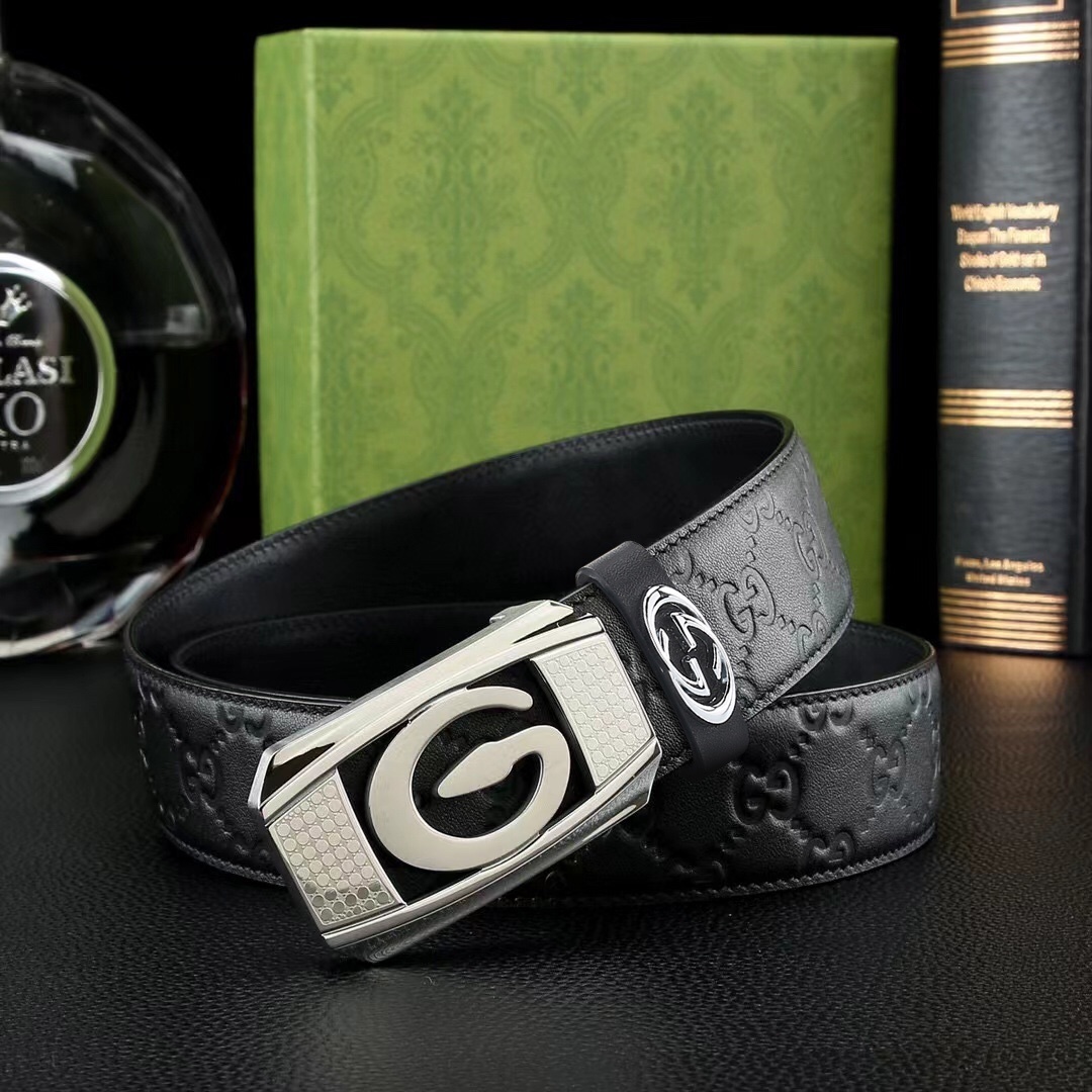 Premium black leather belt with iconic "G" buckle