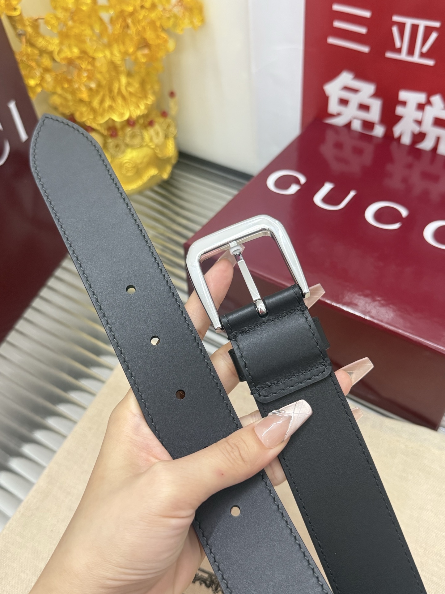 Premium black leather belt with silver buckle detail