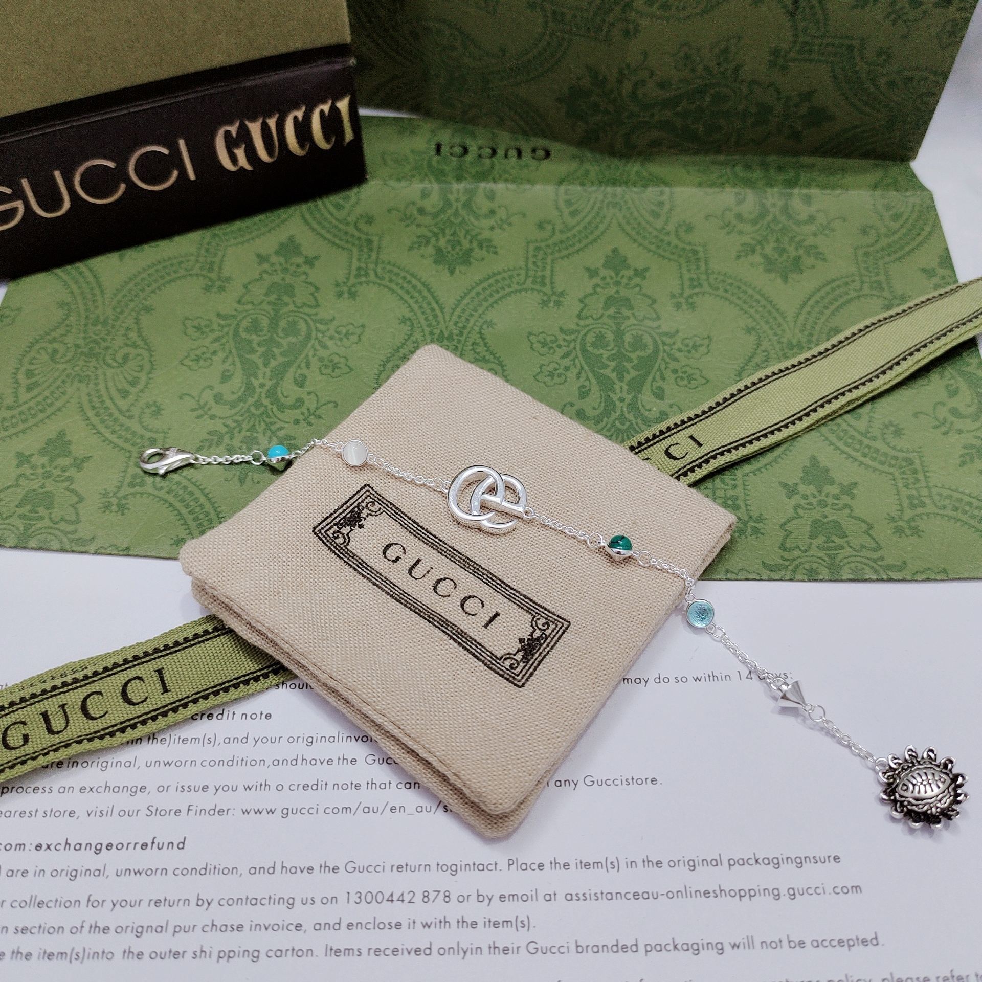 Gucci Silver Charm Bracelet – Turquoise & Opal Accents