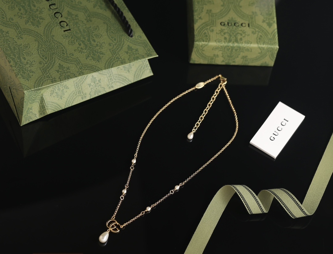 Gucci Gold GG Pearl Pendant Necklace – Designer Elegance
