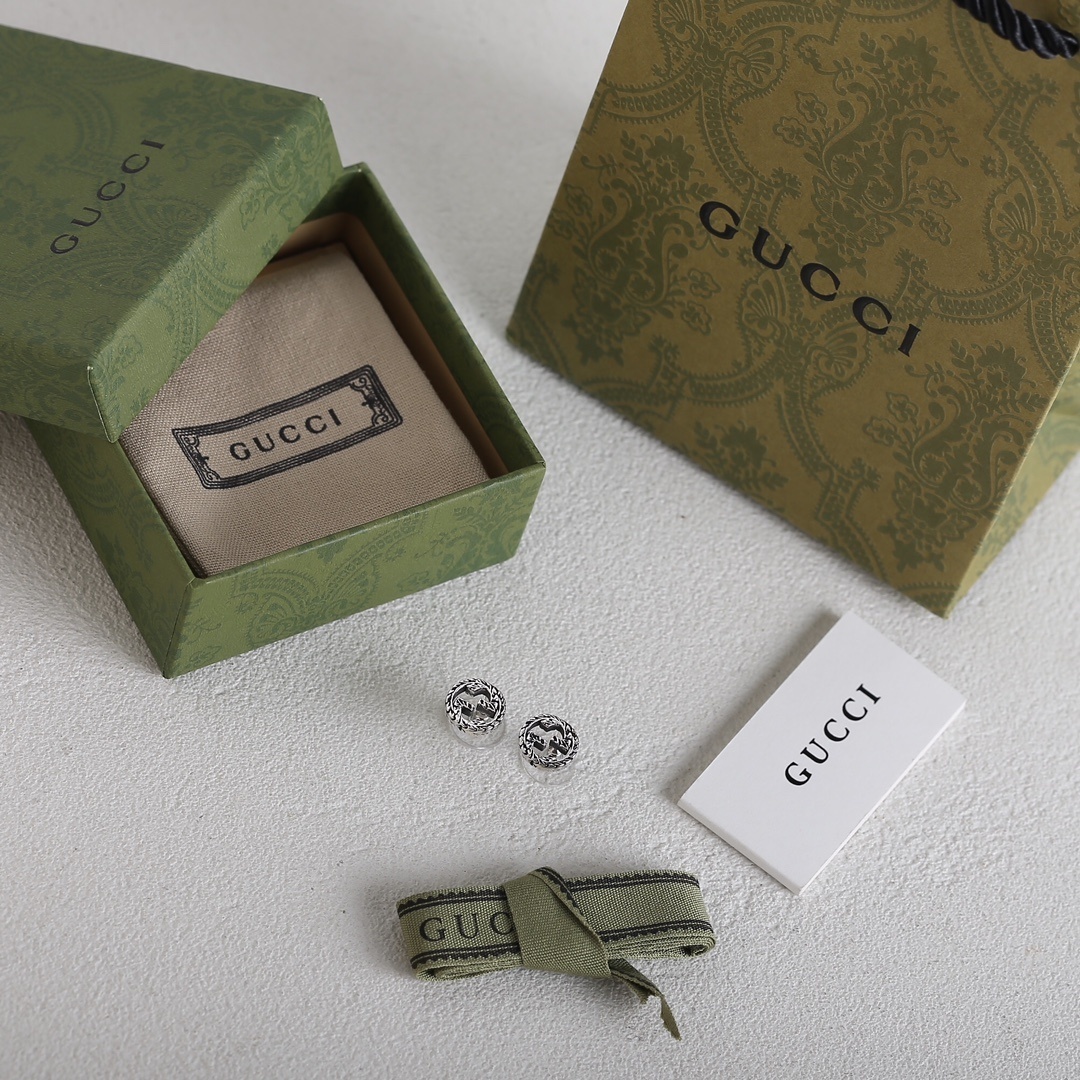 Gucci Silver Interlocking GG Circle Stud Earrings