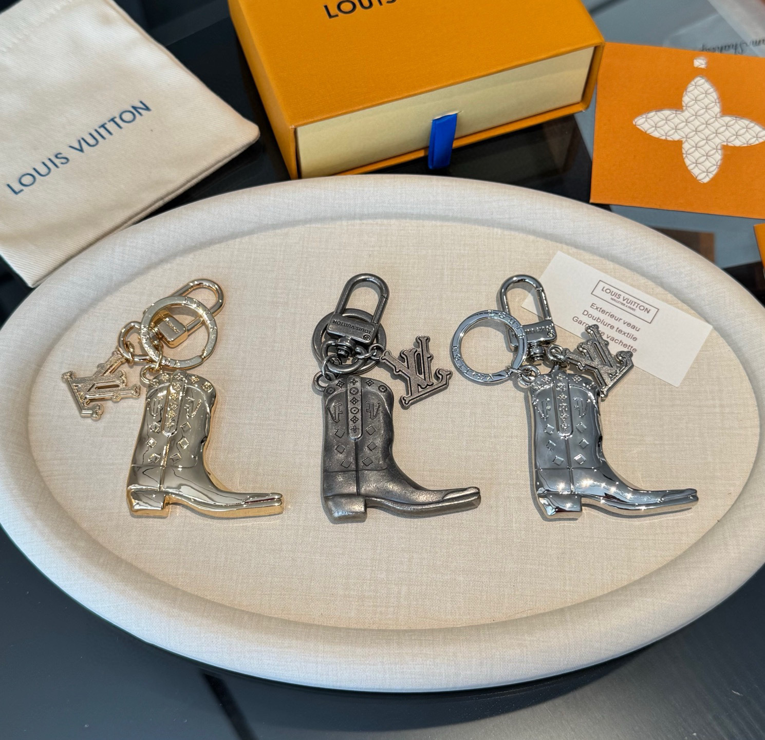 LV Cowboy Boot Keychain Trio – Gold, Silver, Gunmetal