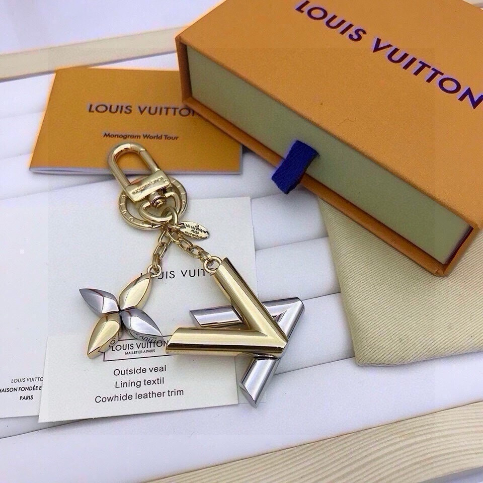 LV Twist Bag Charm gold – LV Twist Bag Charm – Gold & Silver Keychain