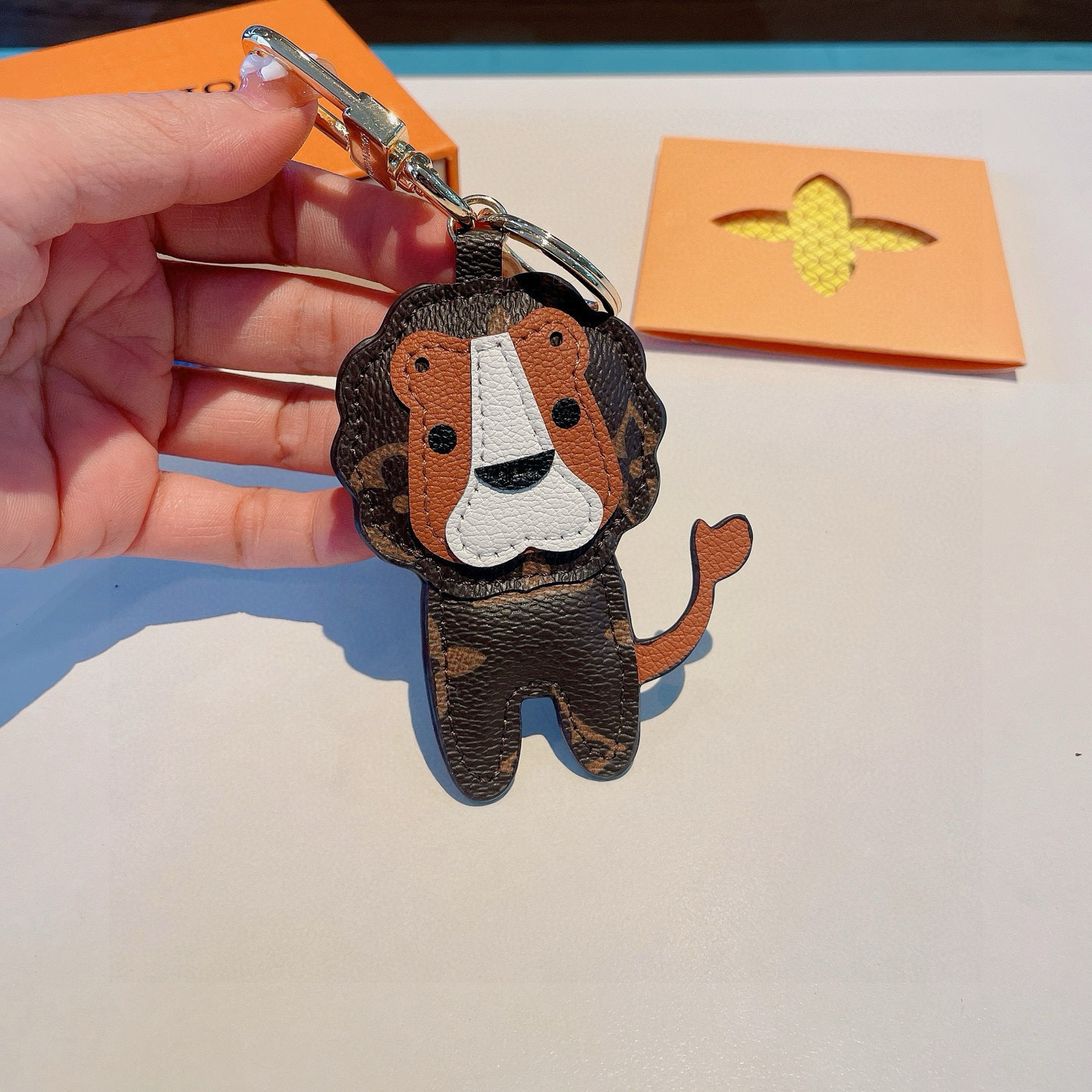 LV Leather Lion Key Charm