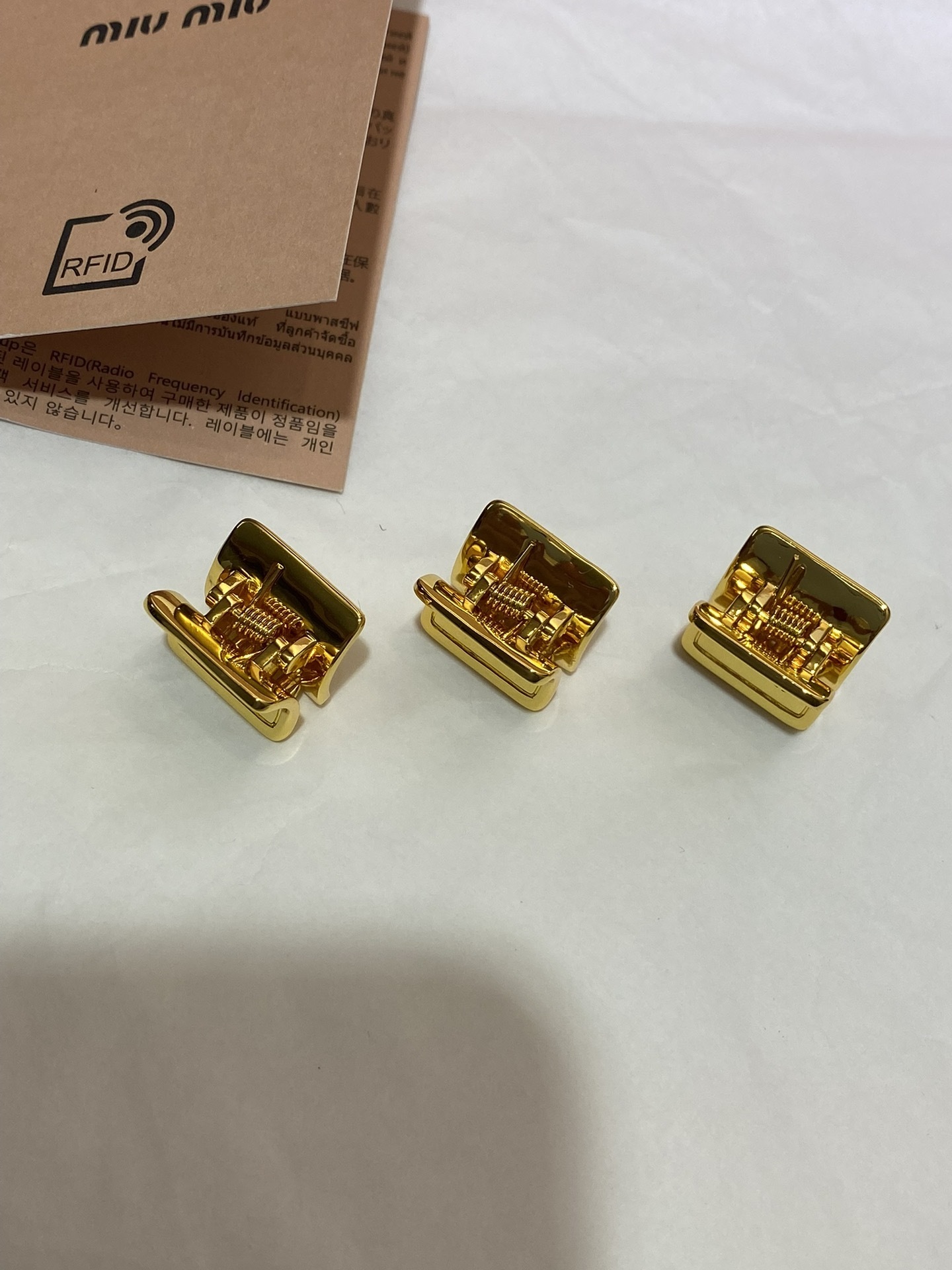 rectangular Miu Miu Gold Hair Clips