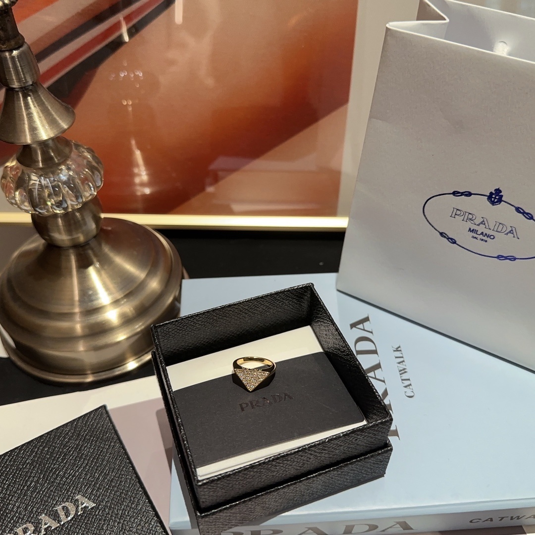 Prada Gold-Tone Crystal Triangle Ring – Designer Statement