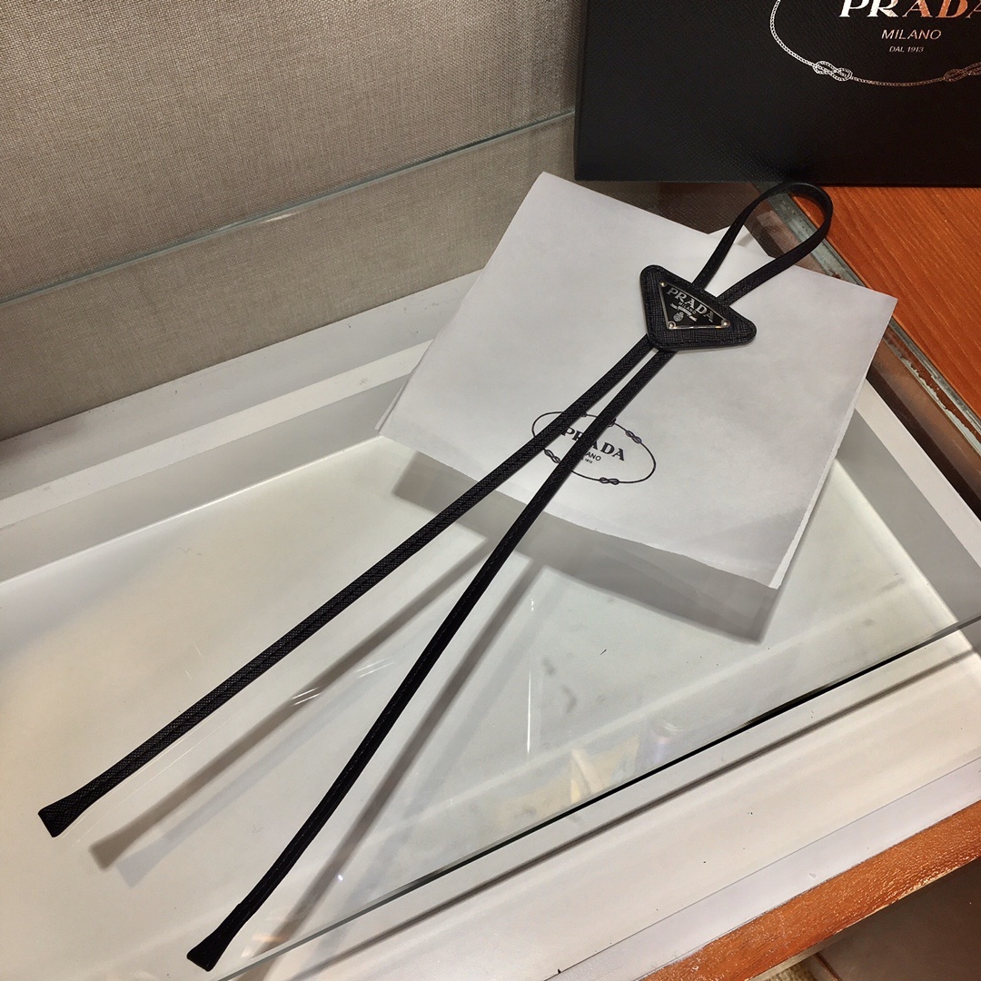 designer Prada Black Leather Bolo Tie – Prada Black Leather Bolo Tie