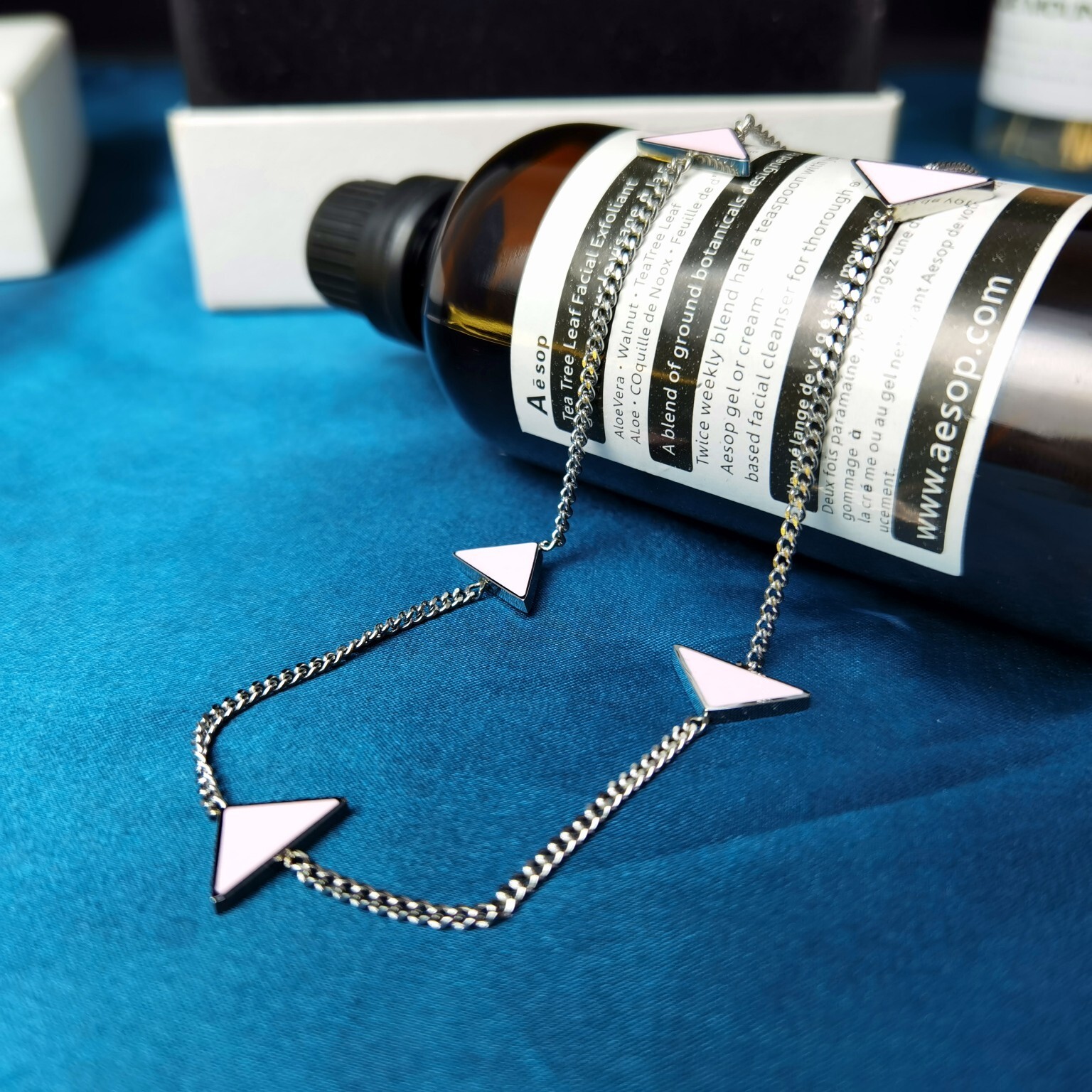 Aesop Silver Triangle Necklace – Designer Accessory