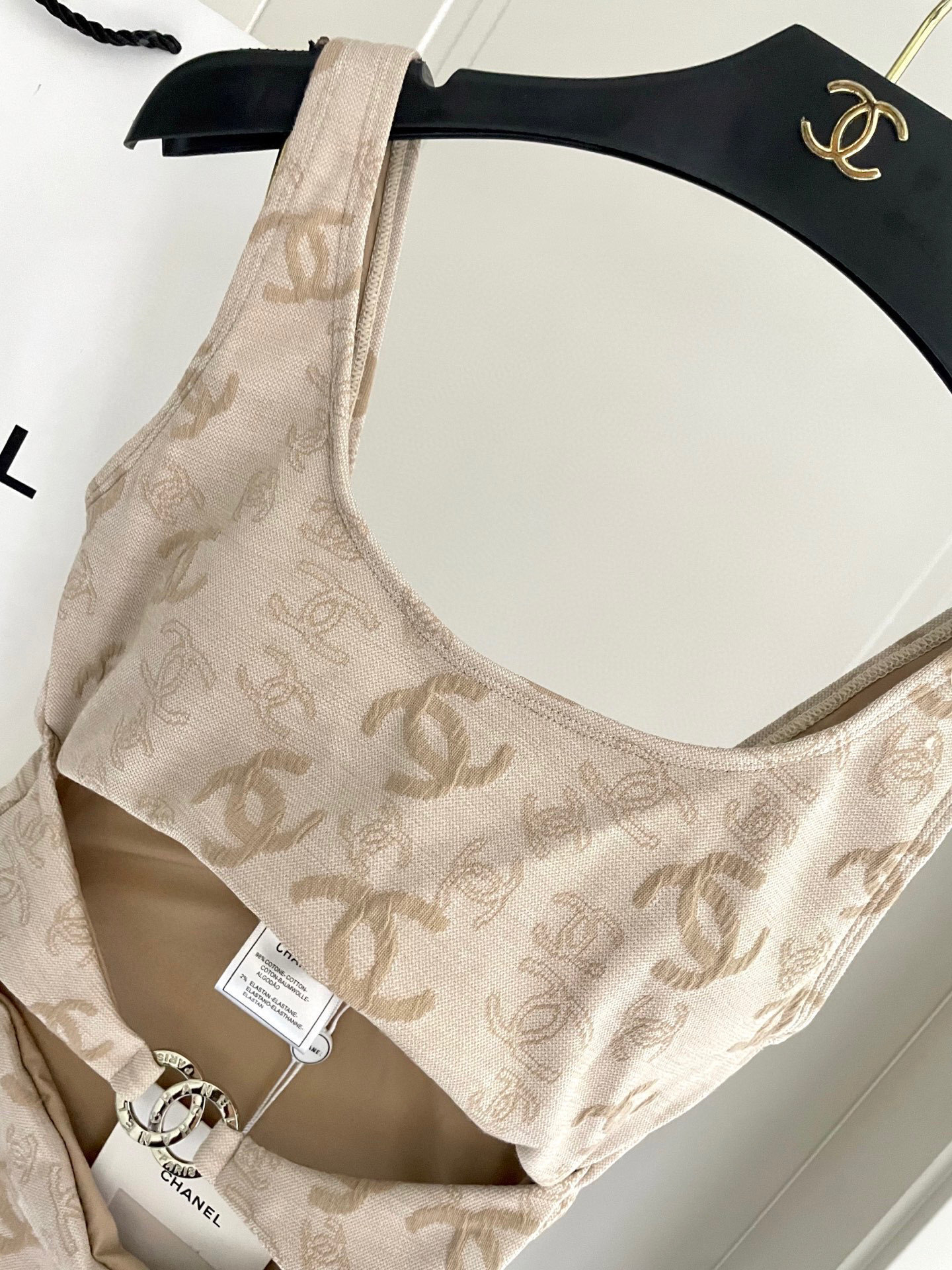 Chanel inspired beige monokini with logo pattern