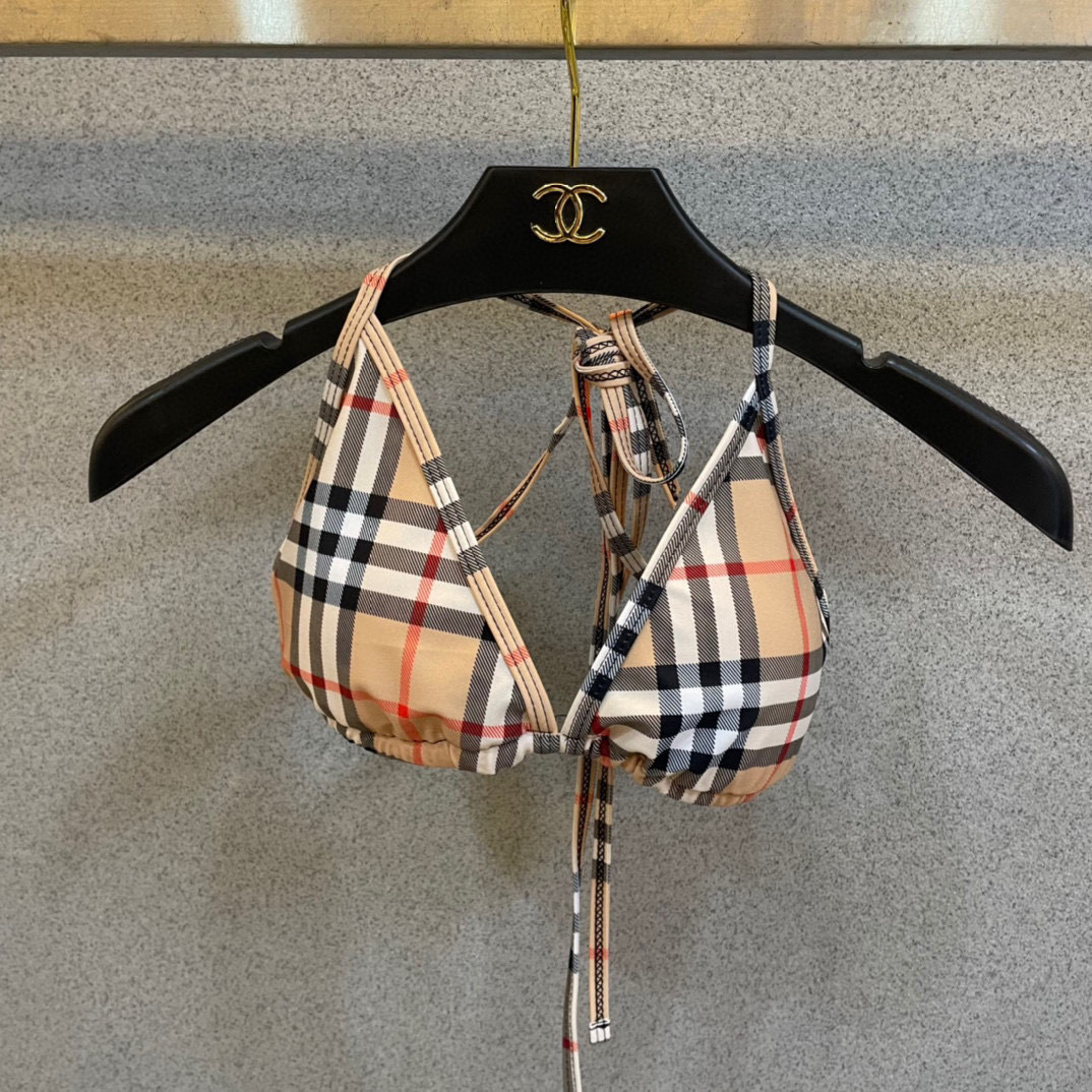 Plaid bikini top and bottom on a hanger