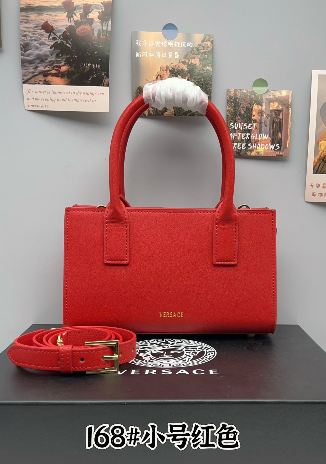 Versace Red Medusa Mini Bag with top handle and shoulder strap on box