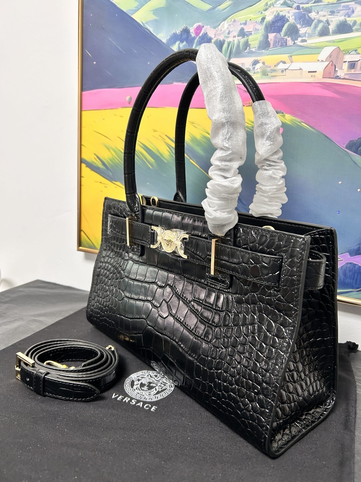 Versace Medusa Crocodile Tote Bag with black embossed leather, gold Medusa clasp, and detachable strap.