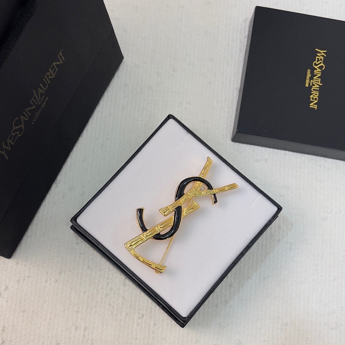 designer elegance YSL Gold & Black Enamel Brooch – YSL Gold & Black