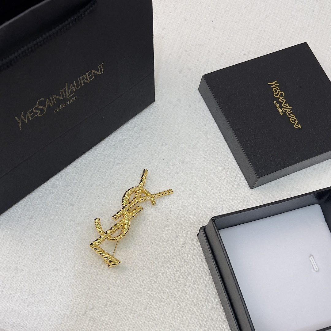 designer Yves Saint Laurent Gold Rope Brooch