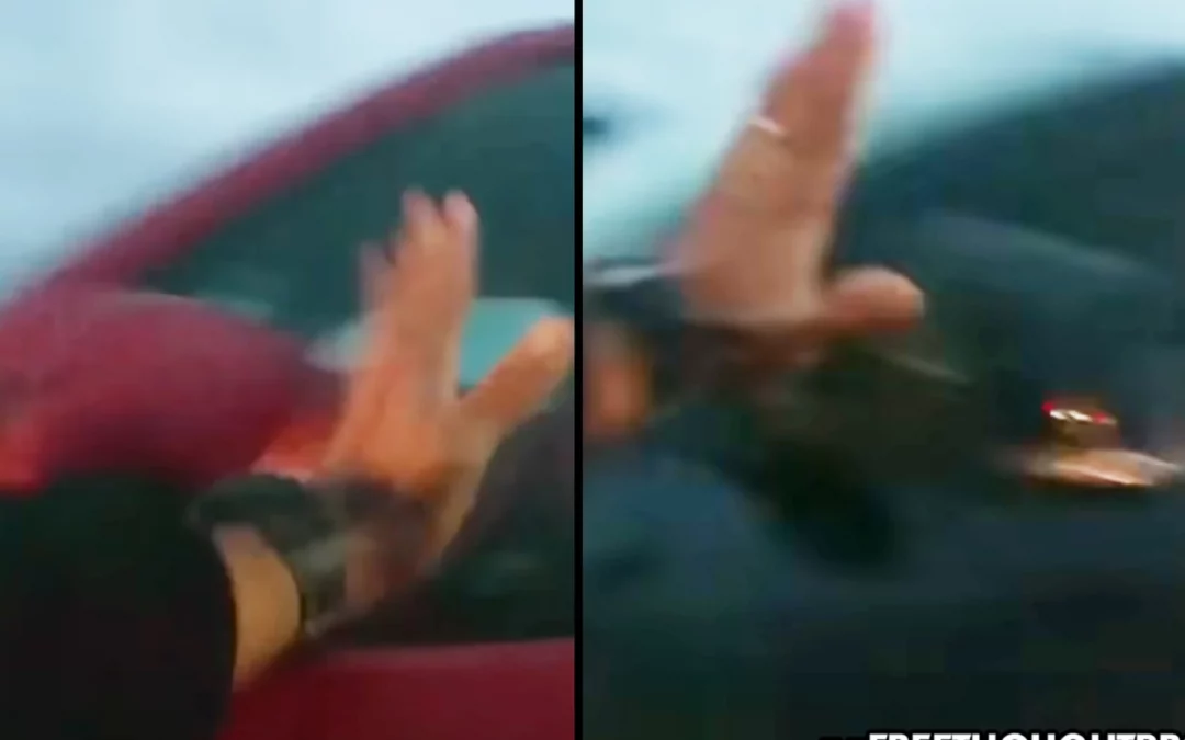 WATCH: Crazy Cop Spontaneously Starts Smashing Side Windows of Random Cars