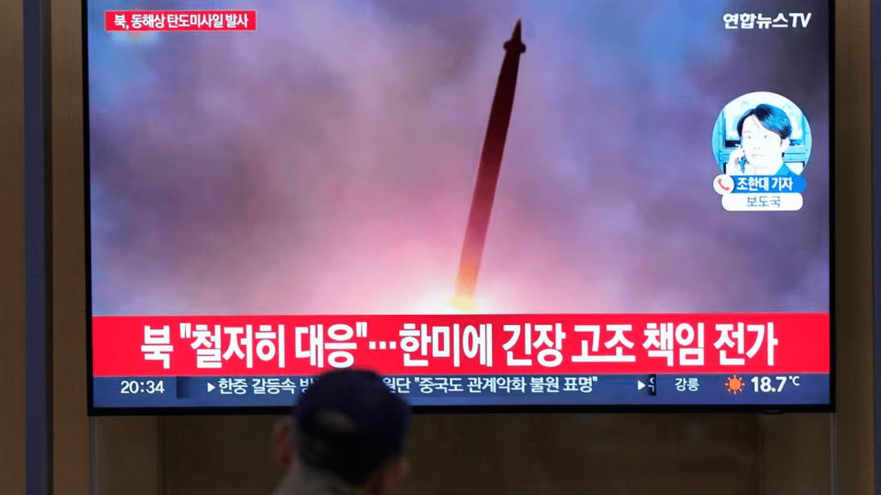 a tv report of the dprk's missile launch with file image during a news program at the seoul railway station on 6 15 23