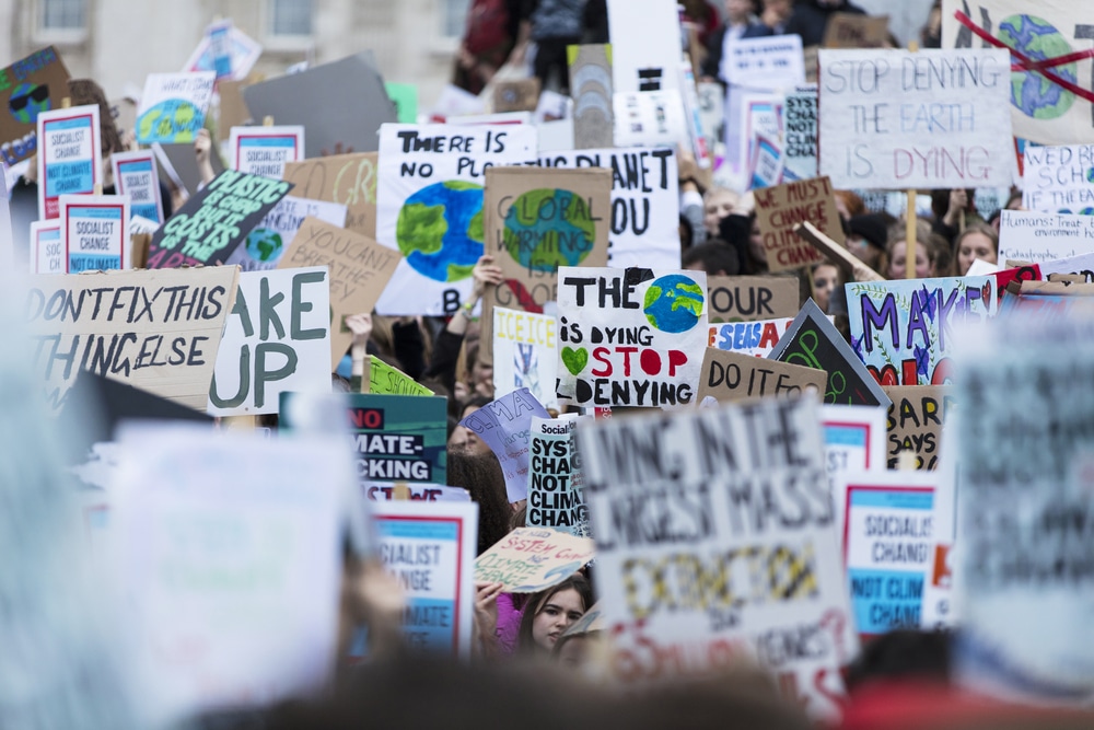 thousands of students and young people protest in london as part of the youth strike for climate marches