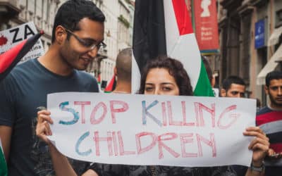 people protesting against gaza strip bombing in milan, italy